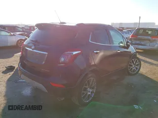 2018 Buick Encore Sport Touring with VIN KL4CJ1SB7JB584900, listed as a IAAI auction lot 41337834 with 66,055 mi miles and . Bid and sale history available at DreamBid. Image 4.
