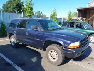 1999 Dodge Durango z VIN 1B4HS28Z9XF536719, wystawiony jako IAAI lot #42641014 z przebiegiem 321 697 mil mil oraz . Historia ofert i sprzedaży dostępna na DreamBid. Obrazek 1.
