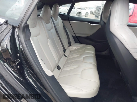 2016 Tesla Model S 70 with VIN 5YJSA1E11GF124965, listed as a IAAI auction lot 41458132 with Not provided miles and . Bid and sale history available at DreamBid. Image 8.