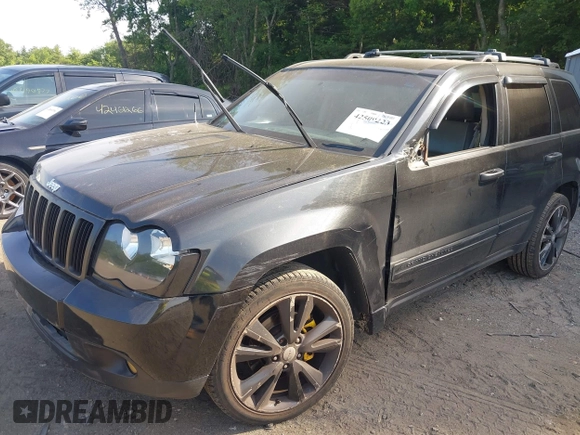 2005 Jeep Grand Cherokee Laredo z VIN 1J4GR48K65C725099, wystawiony jako IAAI lot #42509223 z przebiegiem 249 216 mil mil oraz . Historia ofert i sprzedaży dostępna na DreamBid. Obrazek 18.