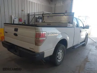 2014 Ford F-150 XL with VIN 1FTFX1EF9EKE41386, listed as a IAAI auction lot 40204338 with 215,536 mi miles. Bid and sale history available at carsss.com. Image 4.