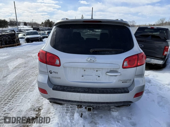2009 Hyundai Santa Fe GL with VIN 5NMSG73E59H293640, listed as a Copart auction lot 52314035 with 157,367 mi miles and Salvage title. Bid and sale history available at DreamBid. Image 6.