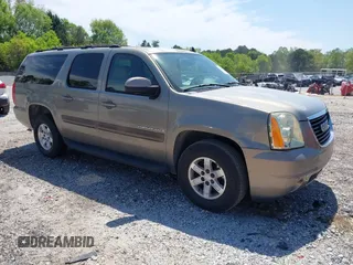 2007 GMC Yukon XL SLT z VIN 1GKFC16087J200390, wystawiony jako IAAI lot #42049673 z przebiegiem 169 174 mil mil oraz . Historia ofert i sprzedaży dostępna na DreamBid. Obrazek 1.