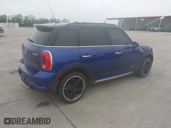 2015 MINI Cooper Countryman S with VIN WMWZC5C50FWP47426, listed as a IAAI auction lot 42108546 with 103,281 mi miles. Bid and sale history available at carsss.com. Image 4.