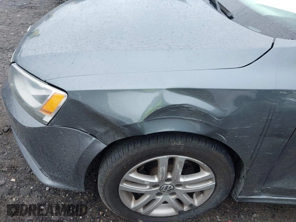 2015 Volkswagen Jetta S z VIN 3VW2K7AJ6FM217381, wystawiony jako IAAI lot #42371909 z przebiegiem 237 510 mil mil oraz . Historia ofert i sprzedaży dostępna na DreamBid. Obrazek 12.