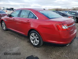 2012 Ford Taurus SEL with VIN 1FAHP2EW0CG133348, listed as a Copart auction lot 83031894 with 231,825 mi miles and Salvage Title. Bid and sale history available at DreamBid. Image 2.