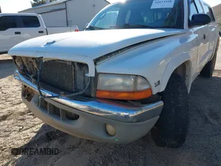 1998 Dodge Dakota SLT with VIN 1B7GG22Y6WS558179, listed as a IAAI auction lot 41673558 with 252,084 mi miles. Bid and sale history available at carsss.com. Image 12.