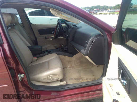 2003 Cadillac CTS with VIN 1G6DM57N230160649, listed as a IAAI auction lot 41696449 with 134,939 mi miles. Bid and sale history available at carsss.com. Image 5.