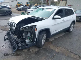 2015 Jeep Cherokee Latitude with VIN 1C4PJMCB1FW751758, listed as a IAAI auction lot 41767154 with 160,349 mi miles. Bid and sale history available at carsss.com. Image 17.
