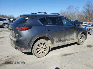 2018 Mazda CX-5 Grand Touring with VIN JM3KFBDM2J0407164, listed as a Copart auction lot 50080345 with 126,464 mi miles and Salvage title. Bid and sale history available at DreamBid. Image 3.