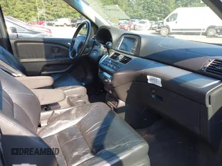 2010 Honda Odyssey Touring with VIN 5FNRL3H97AB104359, listed as a IAAI auction lot 42555872 with 233,952 mi miles and . Bid and sale history available at DreamBid. Image 5.