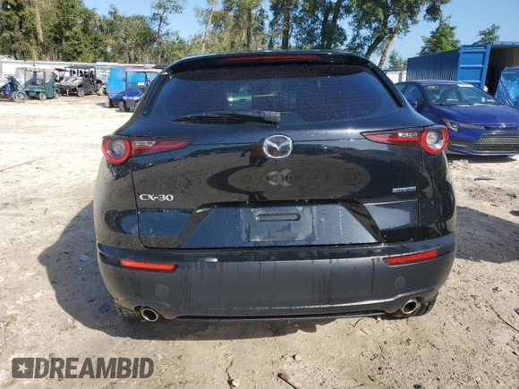 2020 Mazda CX-30 with VIN 3MVDMABL8LM112404, listed as a Copart auction lot 86223234 with 46,459 mi miles and Salvage Title. Bid and sale history available at DreamBid. Image 6.