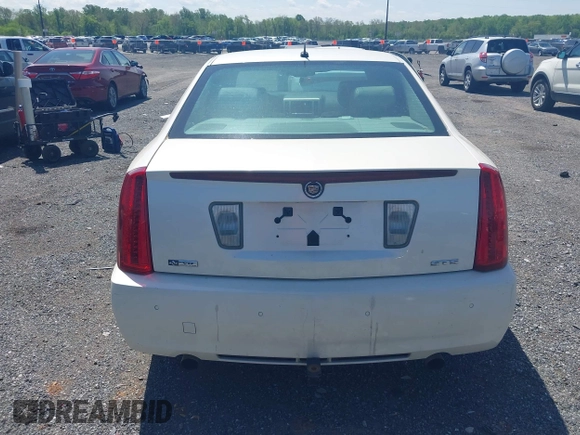 2008 Cadillac STS RWD z VIN 1G6DZ67A580168157, wystawiony jako IAAI lot #42133003 z przebiegiem 133 928 mil mil oraz . Historia ofert i sprzedaży dostępna na DreamBid. Obrazek 16.
