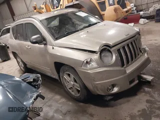 2010 Jeep Compass Sport with VIN 1J4NF4FB7AD501587, listed as a IAAI auction lot 41514419 with 154,826 mi miles. Bid and sale history available at carsss.com. Image 1.