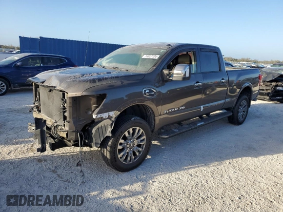 2016 Nissan Titan XD Platinum Reserve with VIN 1N6BA1F25GN506566, listed as a Copart auction lot 74627704 with 87,012 mi miles and Salvage Title. Bid and sale history available at carsss.com. Image 1.