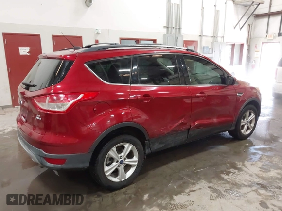2014 Ford Escape SE z VIN 1FMCU9GX5EUA05294, wystawiony jako IAAI lot #42282028 z przebiegiem 119 046 mil mil oraz . Historia ofert i sprzedaży dostępna na DreamBid. Obrazek 4.