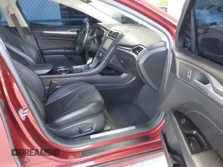 2014 Ford Fusion Titanium с VIN 3FA6P0SU3ER126548, выставлен на аукционе IAAI как лот 42634957 с пробегом 111 580 миль миль и . История ставок и продаж доступна на DreamBid. Изображение 5.