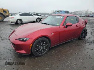 2024 Mazda MX-5 Miata Grand Touring z VIN JM1NDAM75R0600632, wystawiony jako Copart lot #85427064 z przebiegiem 7 332 mil mil oraz Szkoda całkowita • Salvage title. Historia ofert i sprzedaży dostępna na DreamBid. Obrazek 1.