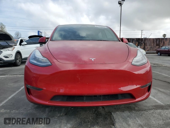 2021 Tesla Model Y Long Range with VIN 5YJYGDEEXMF217816, listed as a Copart auction lot 51008665 with 57,392 mi miles and Salvage Title. Bid and sale history available at DreamBid. Image 5.