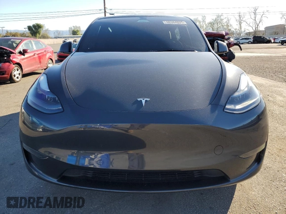 2024 Tesla Model Y with VIN 7SAYGDED7RF108604, listed as a Copart auction lot 48384825 with 24,603 mi miles and Salvage Title. Bid and sale history available at DreamBid. Image 5.