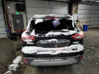 2015 Ford Escape Titanium with VIN 1FMCU0J91FUA41653, listed as a Copart auction lot 88871205 with 128,971 mi miles and Salvage Title. Bid and sale history available at DreamBid. Image 6.