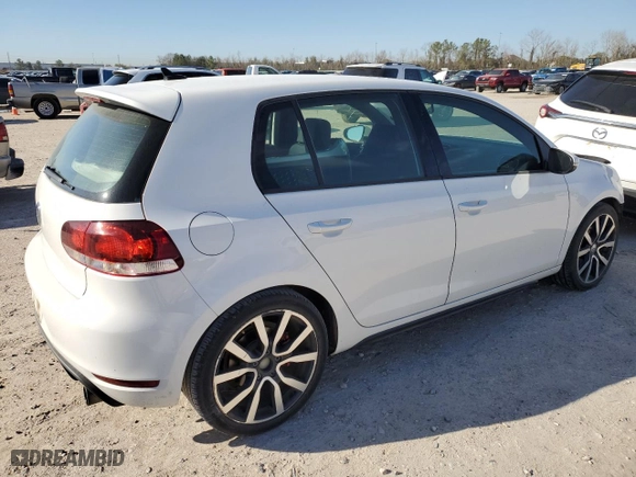 2014 Volkswagen GTI Driver's Edition with VIN WVWHD7AJ4EW005665, listed as a Copart auction lot 48032485 with 64,635 mi miles and Salvage Title. Bid and sale history available at carsss.com. Image 3.