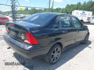 2004 Ford Focus SE z VIN 1FAFP34Z54W175689, wystawiony jako IAAI lot #42553615 z przebiegiem 188 652 mil mil oraz . Historia ofert i sprzedaży dostępna na DreamBid. Obrazek 4.
