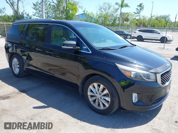 2016 Kia Sedona SX with VIN KNDMC5C15G6143818, listed as a IAAI auction lot 42051284 with 97,666 mi miles and . Bid and sale history available at carsss.com. Image 1.