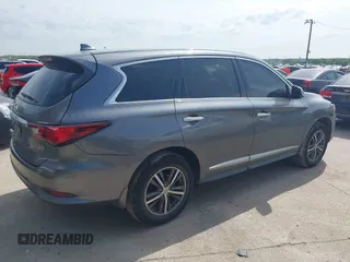 2019 Infiniti QX60 PURE with VIN 5N1DL0MM2KC514807, listed as a IAAI auction lot 41888970 with 71,561 mi miles. Bid and sale history available at carsss.com. Image 4.