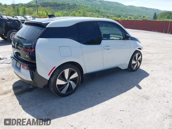 2015 BMW i3 z VIN WBY1Z4C58FV501754, wystawiony jako IAAI lot #42220253 z przebiegiem 59 022 mil mil oraz . Historia ofert i sprzedaży dostępna na DreamBid. Obrazek 4.
