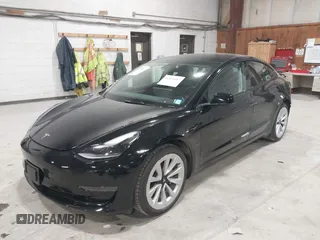 2023 Tesla Model 3 with VIN 5YJ3E1EA5PF552241, listed as a IAAI auction lot 41876487 with 18,533 mi miles and . Bid and sale history available at carsss.com. Image 2.