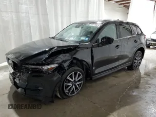 2018 Mazda CX-5 Grand Touring with VIN JM3KFBDM1J0440947, listed as a Copart auction lot 48579825 with 63,164 mi miles and Non Repairable. Bid and sale history available at carsss.com. Image 1.
