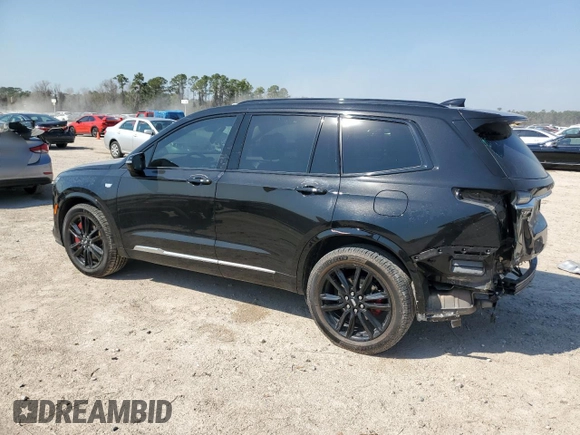2022 Cadillac XT6 Sport with VIN 1GYKPHRS0NZ175482, listed as a Copart auction lot 47362325 with 47,584 mi miles and Salvage Title. Bid and sale history available at carsss.com. Image 2.