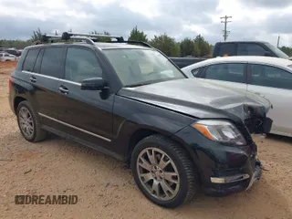 2013 Mercedes-Benz GLK with VIN WDCGG8JB1DF975483, listed as a IAAI auction lot 41880786 with 180,084 mi miles. Bid and sale history available at carsss.com. Image 1.
