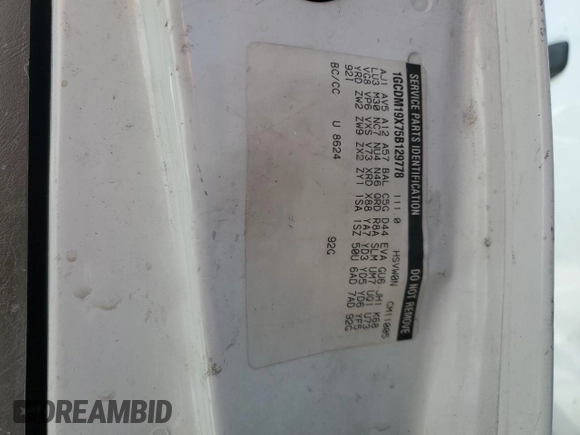 2005 Chevrolet Astro Cargo z VIN 1GCDM19X75B129778, wystawiony jako Copart lot #51354005 z przebiegiem 152 893 mil mil oraz Szkoda całkowita • Salvage title. Historia ofert i sprzedaży dostępna na DreamBid. Obrazek 12.