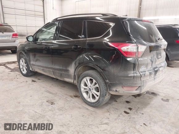 2018 Ford Escape SE z VIN 1FMCU9GD0JUC25636, wystawiony jako IAAI lot #40996760 z przebiegiem 70 097 mil mil oraz . Historia ofert i sprzedaży dostępna na DreamBid. Obrazek 3.