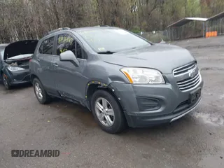 2015 Chevrolet Trax LT with VIN KL7CJRSBXFB097960, listed as a IAAI auction lot 41976883 with 98,621 mi miles and . Bid and sale history available at carsss.com. Image 1.