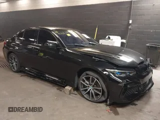 2020 BMW 3 Series 330i xDrive with VIN WBA5R7C05LFH42556, listed as a IAAI auction lot 40687893 with 74,290 mi miles. Bid and sale history available at carsss.com. Image 1.
