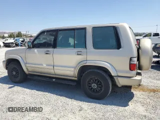 2002 Isuzu Trooper S z VIN JACDS58X527J08603, wystawiony jako Copart lot #63357674 z przebiegiem 218 282 mil mil oraz Szkody całkowita. Historia ofert i sprzedaży dostępna na DreamBid. Obrazek 2.