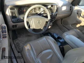 2002 Mazda Tribute LX with VIN 4F2YU091X2KM22268, listed as a Copart auction lot 82915484 with 70,684 mi miles and Clean Title. Bid and sale history available at carsss.com. Image 8.