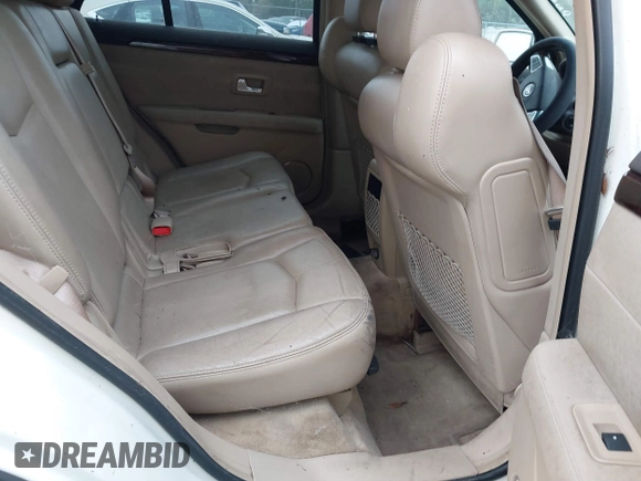 2008 Cadillac SRX RWD z VIN 1GYEE637580123768, wystawiony jako IAAI lot #41802877 z przebiegiem 149 249 mil mil oraz . Historia ofert i sprzedaży dostępna na DreamBid. Obrazek 8.