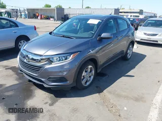 2021 Honda HR-V LX with VIN 3CZRU6H37MM713309, listed as a IAAI auction lot 42171397 with 25,693 mi miles and . Bid and sale history available at carsss.com. Image 2.
