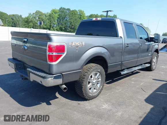 2013 Ford F-150 XL with VIN 1FTFW1ET5DFD42810, listed as a IAAI auction lot 42681301 with 154,021 mi miles and . Bid and sale history available at DreamBid. Image 4.