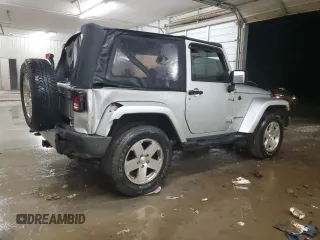 2009 Jeep Wrangler Sahara z VIN 1J4FA54189L789642, wystawiony jako Copart lot #89078145 z przebiegiem 128 902 mil mil oraz Szkoda całkowita • Salvage title. Historia ofert i sprzedaży dostępna na DreamBid. Obrazek 3.