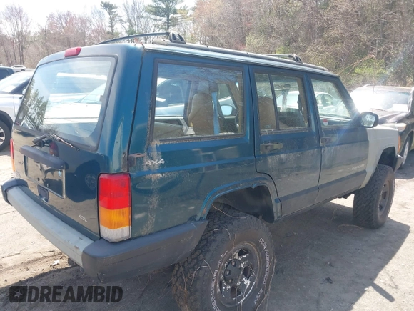 1998 Jeep Cherokee Sport with VIN 1J4FJ68S6WL151698, listed as a IAAI auction lot 42100846 with 239,466 mi miles. Bid and sale history available at carsss.com. Image 4.