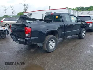 2018 Toyota Tacoma SR with VIN 5TFSX5EN1JX062523, listed as a IAAI auction lot 42334816 with 56,994 mi miles and . Bid and sale history available at DreamBid. Image 4.