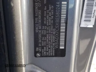2011 BMW 3 Series 335i with VIN WBADX7C5XBE580244, listed as a Copart auction lot 44993215 with 124,091 mi miles and Salvage Title. Bid and sale history available at carsss.com. Image 12.