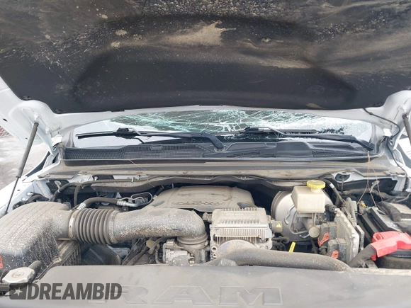 2021 Ram 1500 Big Horn z VIN 1C6RREFT2MN647379, wystawiony jako IAAI lot #42094375 z przebiegiem 57 121 mil mil oraz . Historia ofert i sprzedaży dostępna na DreamBid. Obrazek 10.