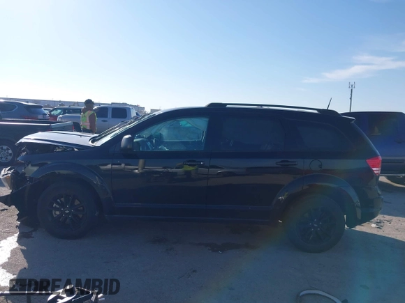 2020 Dodge Journey SE Value with VIN 3C4PDCAB9LT250865, listed as a IAAI auction lot 41601741 with 68,620 mi miles and . Bid and sale history available at DreamBid. Image 14.