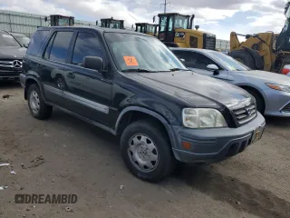 1999 Honda CR-V LX with VIN JHLRD2845XC018102, listed as a Copart auction lot 41791005 with 103,716 mi miles and Salvage Title. Bid and sale history available at carsss.com. Image 4.